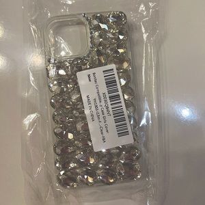 Brand new in package. Gorgeous iPhone 13 mini cover